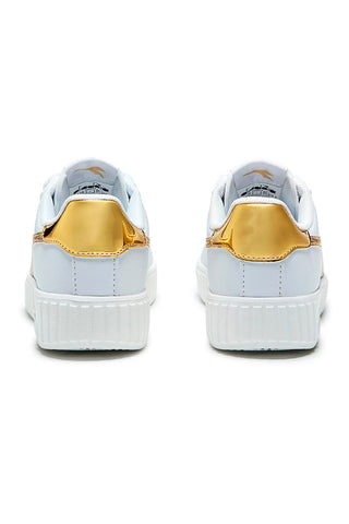 Sneakers bianche con logo oro e platform Diadora Game Step Disco PS