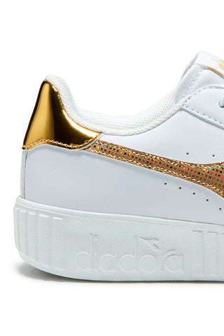 Sneakers bianche con logo oro e platform Diadora Game Step Disco PS