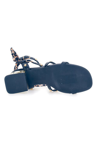 Schwarze Sandalen mit Nieten, Animal-Laces und geometrischem Absatz Mon Dieu 1652