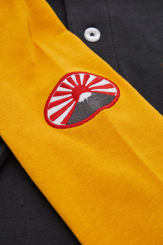 Polo nera con maniche gialle a contrasto Pitt Kids PT-PL-8011