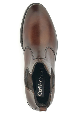 Braune Chelsea-Stiefel im Café kosten 5143