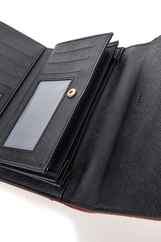 Portafoglio rosso con texture animalier e dettagli dorati Lancetti LL25W-501-68